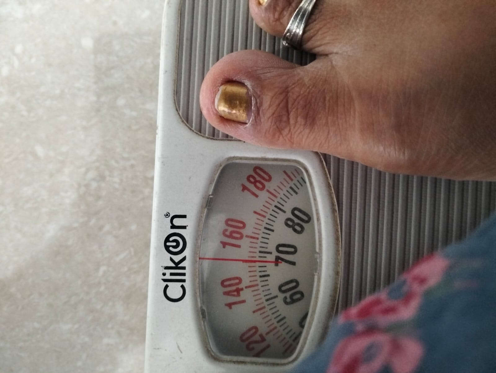 Her weight starting to come down over the program