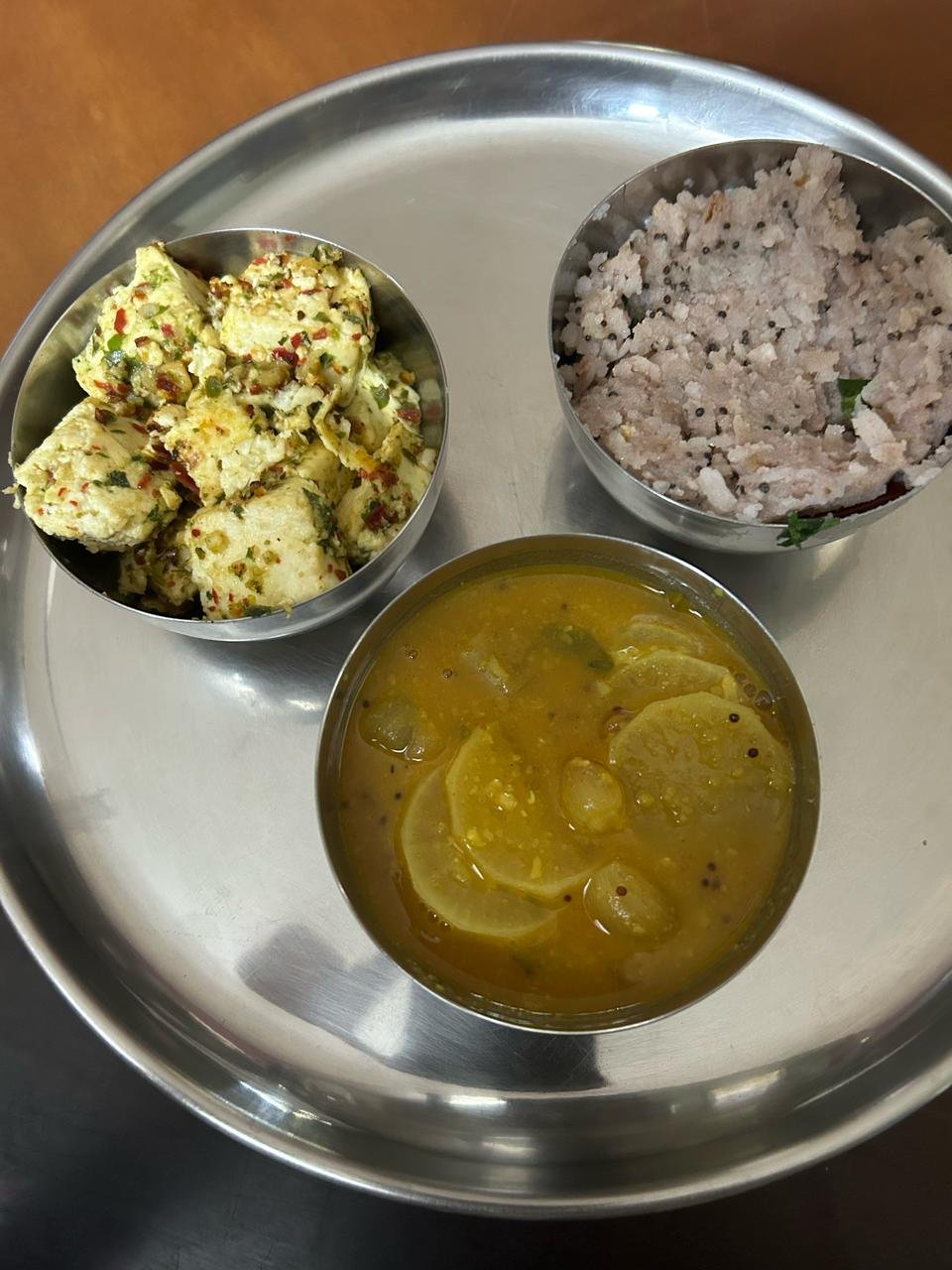 Lunch plate with rice, sambar, vegetables and curd